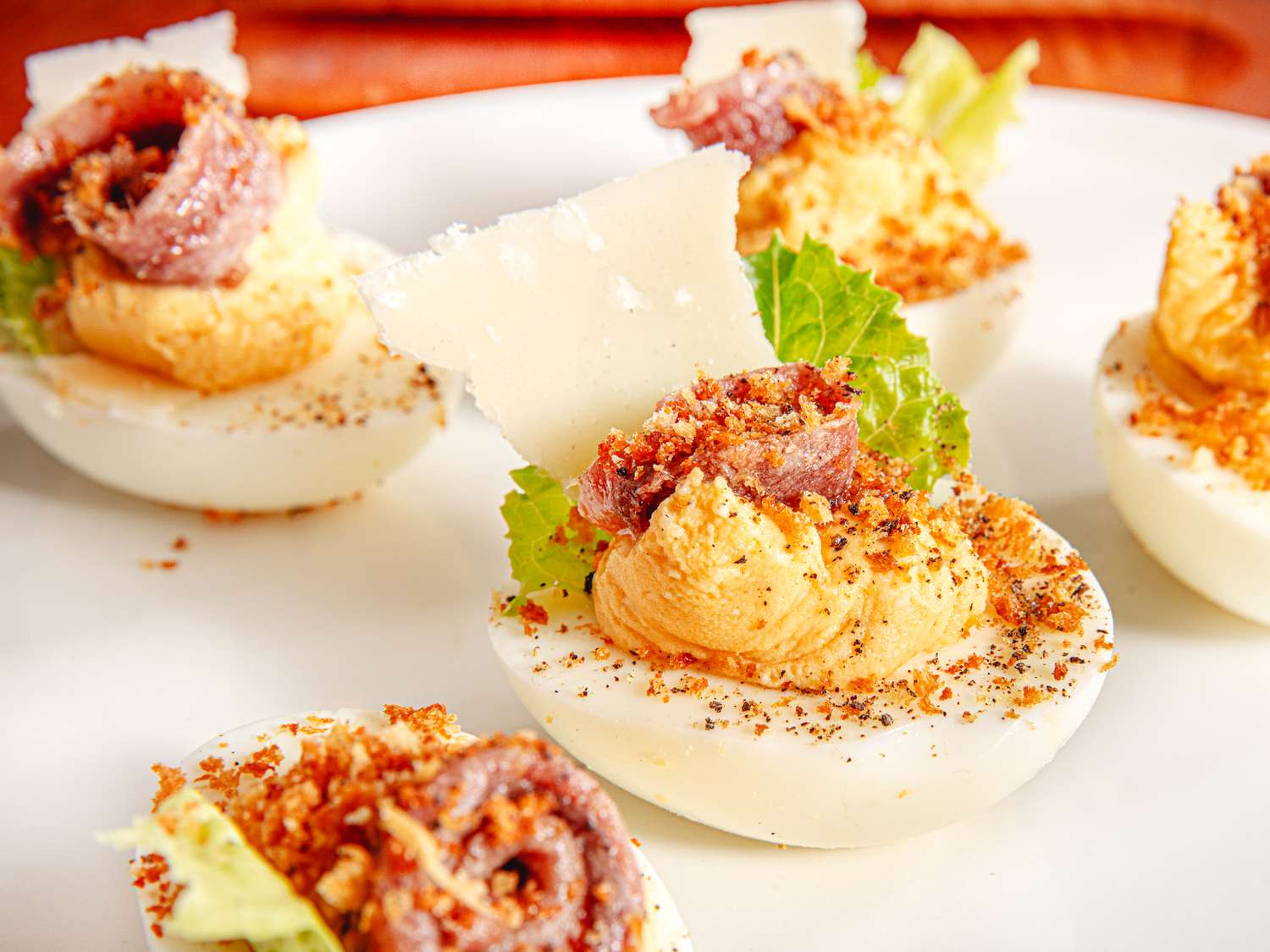 Side view of Caesar-ed deviled eggs