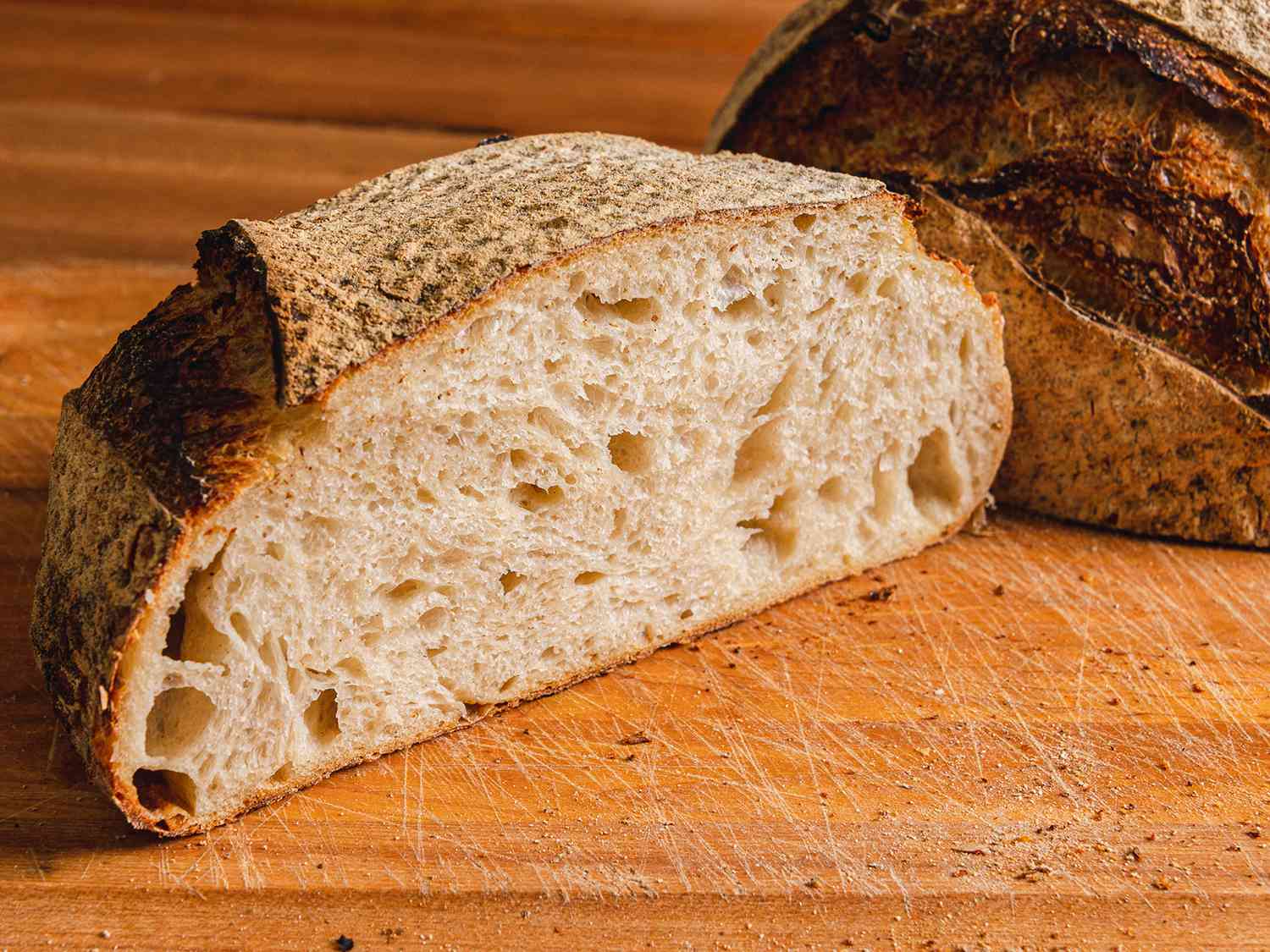 a bread loaf cut in half to display the crumb