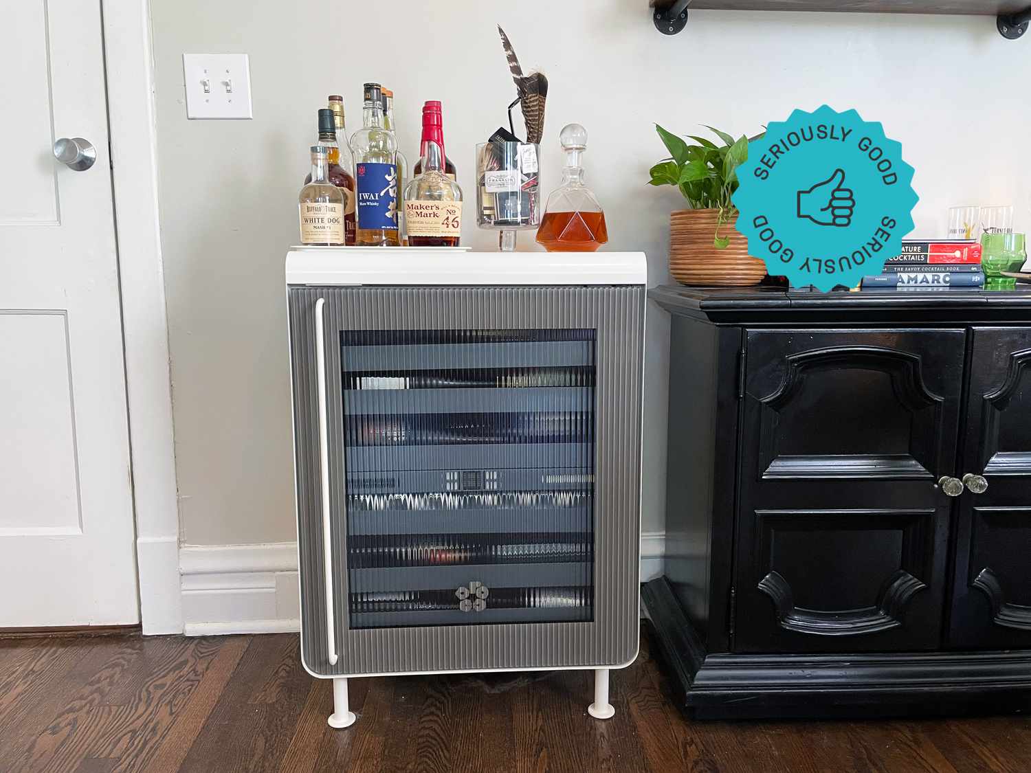 rocco smart fridge with liquor bottles on top