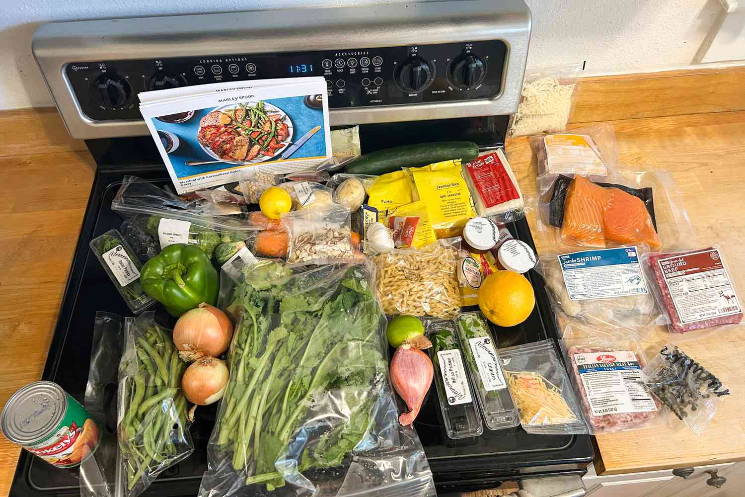 Marley Spoon meal ingredients arranged on a kitchen counter