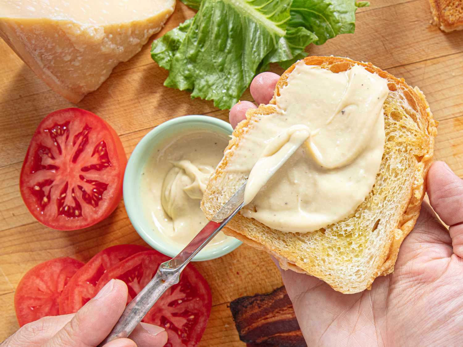 Overhead view of caesar mayo on a piece of bread