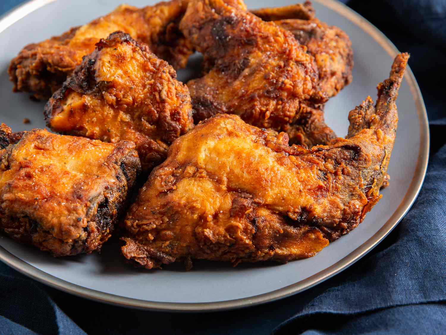 Buttermilk fried rabbit pieces on a serving plate