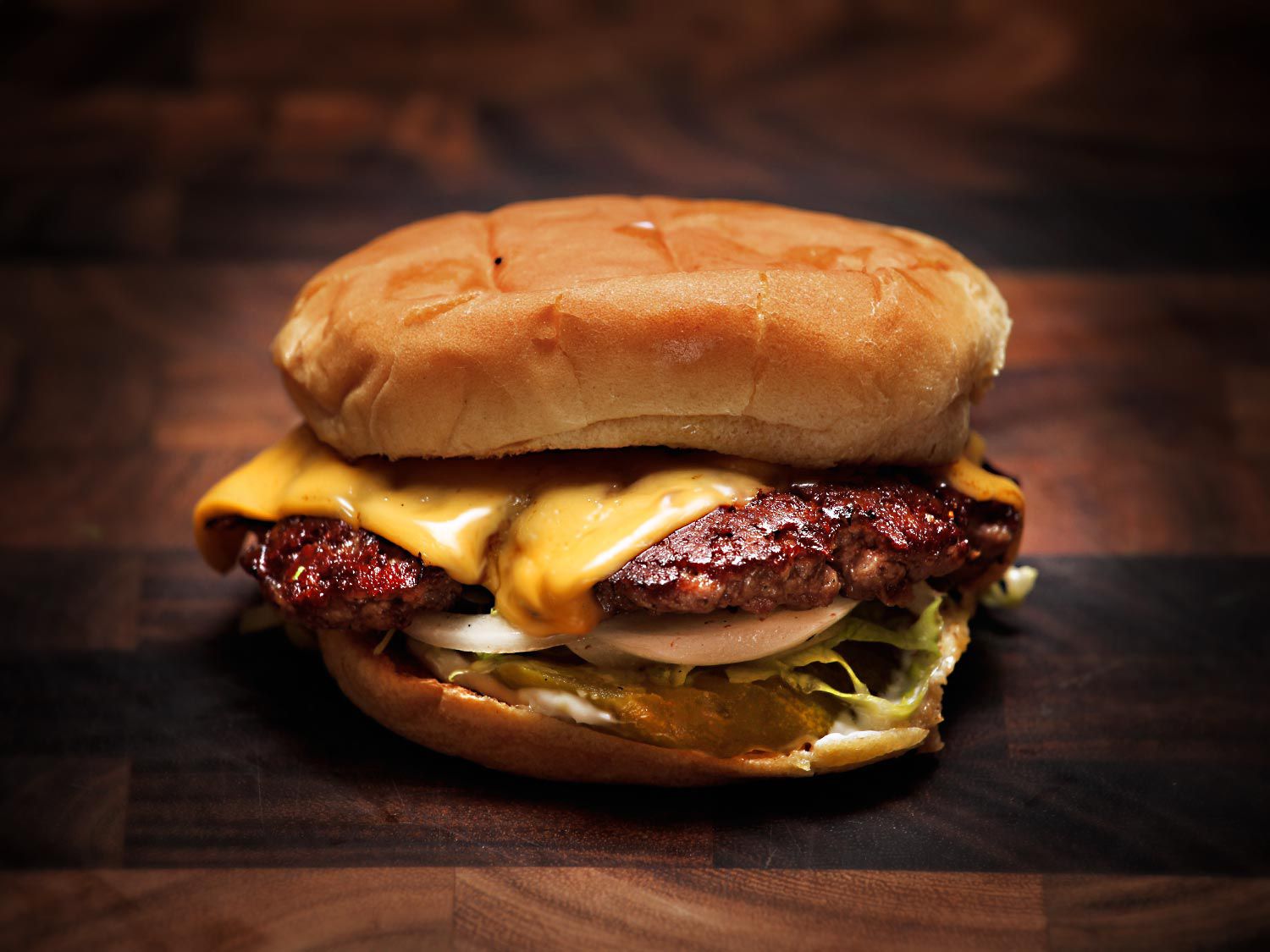 Close-up of a cheeseburger. 