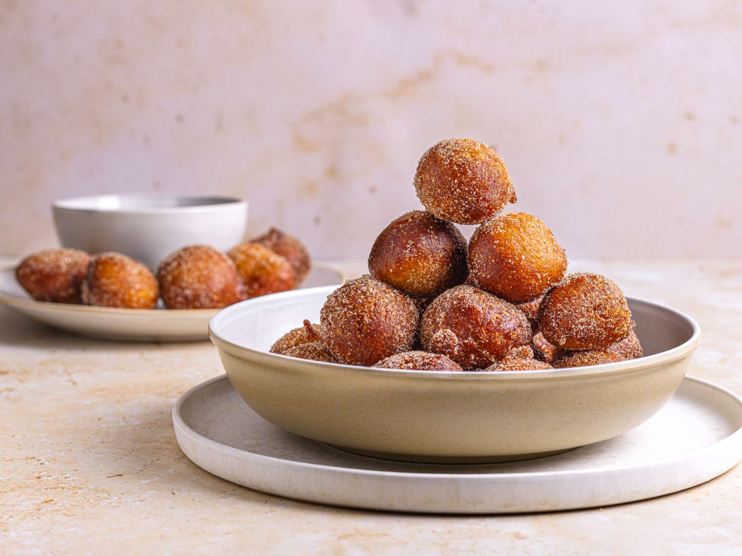 Puff Puff stacked neatly in a bowl in a pyramid formation