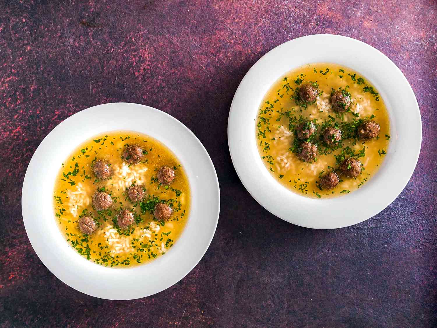 two bowls of Shurabet el Eid on a dark purple background