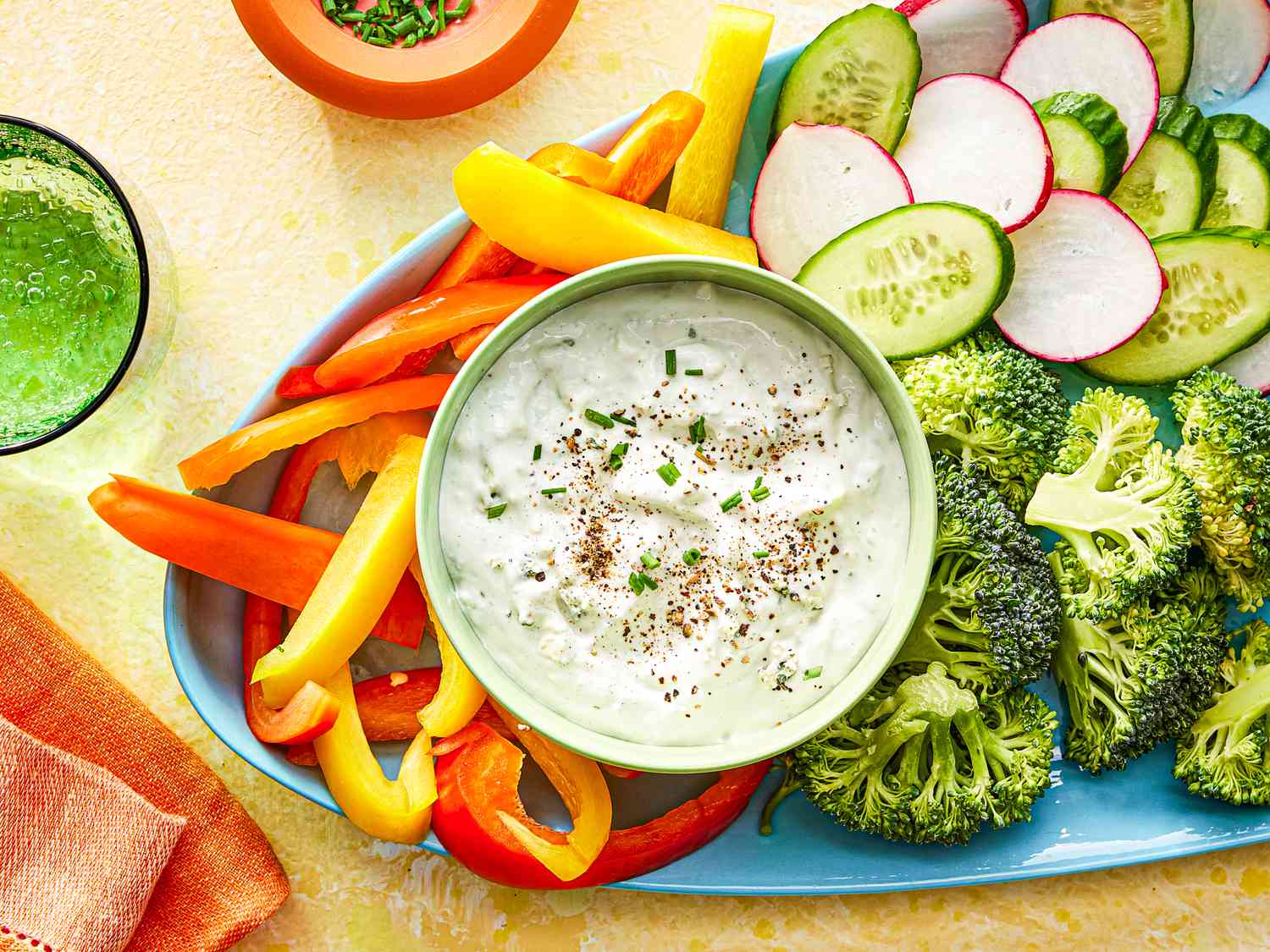 Overhead view of blue cheese dip on a veggie platter