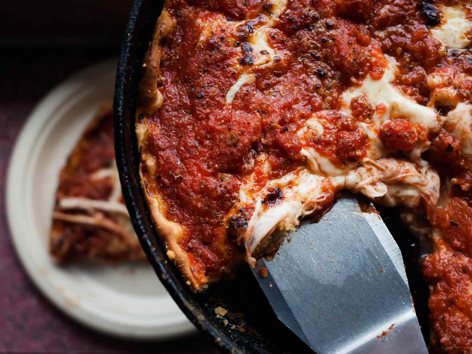 overhead closeup shot of a pan of Chicago Deep Dish Pizza