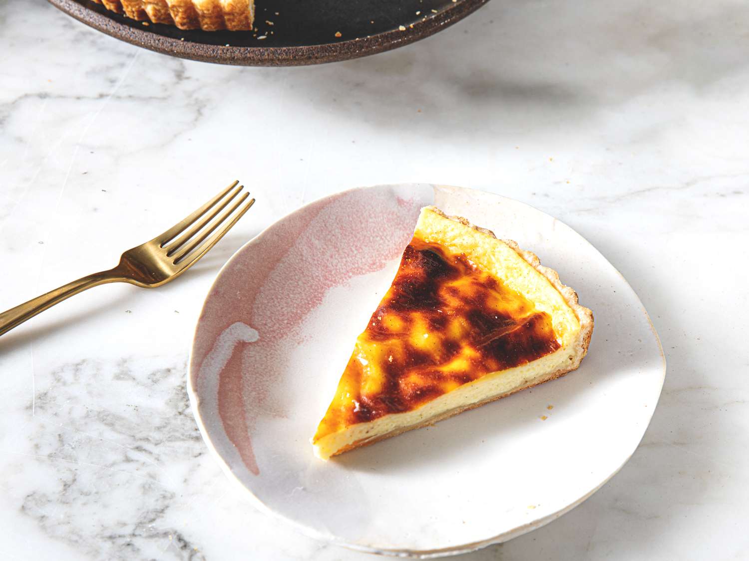 Overhead view of a slice of Flan PÃ¢tissier