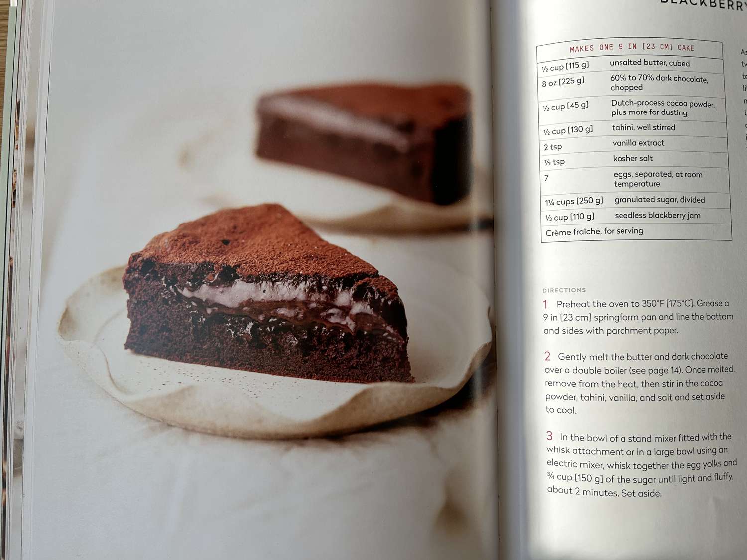 The Chocolate Lover cookbook open to a recipe for chocolate cake