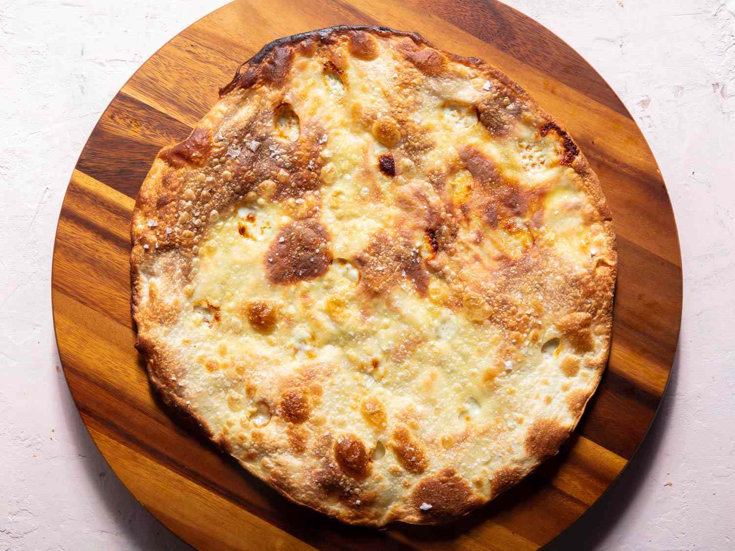 Overhead of a focaccia di Recco on a serving board